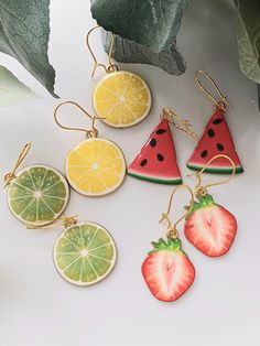 Pretty enamel fruit earrings  Plated brass earhooks hypoallergenic  I hope you love these earrings as much as I did making them. If you want to make any alterations please just ask I have been selling on other platforms for many years so thought I would open an Etsy shop . All orders will be sent with bubble wrap in a pouch inside a padded jiffy envelope  You can be assured of super customer service and prompt replies Thank you for looking Red Watermelon, Opening An Etsy Shop, Fruit Earrings, Red Strawberry, Summer Fruit, Bubble Wrap, Jewelry Earrings Dangle, Dangle Drop Earrings, Dangle Earrings