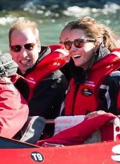 two women riding in a boat on the water