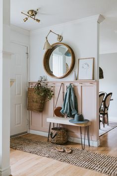 an instagram page with a pink bench and mirror on the wall in front of it