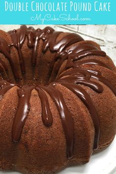 a chocolate pound cake on a white plate with the words, double chocolate pound cake