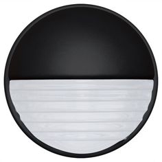 a black and white circular light fixture