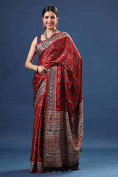 Shop stunning red Ajrakh print modal silk sari online in USA. Make a fashion statement at weddings with stunning designer sarees, embroidered sarees with blouse, wedding sarees, handloom sarees from Pure Elegance Indian fashion store in USA.-full view Festive Red Kalamkari Pre-draped Saree, Luxury Red Saree With Printed Border, Red Semi-stitched Kalamkari Saree, Ajrak Print Saree, Red Kalamkari Print Pre-draped Saree, Red Dates, Fashion Journals, Traditional Fabric, Handloom Saree