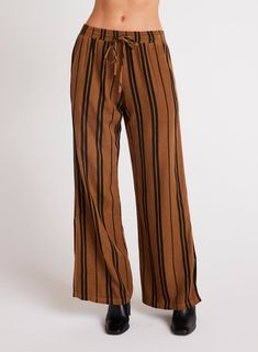 Introducing our Side Slit Wide Leg striped pant in a sophisticated combination of brown and black stripes. 51% Rayon 28% Tencel 21% Linen. Wear them with the Elastic Waist Blouse. SIZE WAIST WAIST TO HEM INSEAM XS 26" 41 1/2" 30 1/2" S 28" 42" 30 1/2" M 30" 42 1/2" 30 1/2" L 32" 43" 30 1/2" Fat Thor, Couples Costume, Striped Pant, Bella Dahl, Wide Leg Pant, Classy And Fabulous, Couples Costumes, Striped Pants, Black Stripes