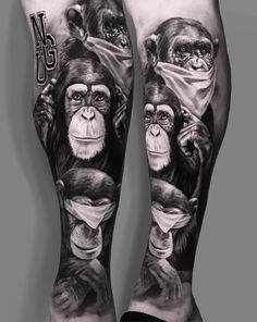 the legs are covered in tattoos with three monkeys on them and one is wearing a surgical mask