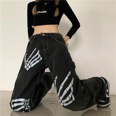 Material: Cotton, Polyester Fabric Type: Cotton denim Pattern: Skeleton hands print Waist Type: High Closure Type: Zip up Style: Y2K Aesthetic Size (cm) Pants Length Waist Hip Thigh Width S 103 64 100 62 M 104 68 104 64 L 105 72 108 66 XL 106 76 112 68 Size (inch) Pants Length Waist Hip Thigh Width S 40.55 25.20 39.37 24.41 M 40.94 26.77 40.94 25.20 L 41.34 28.35 42.52 25.98 XL 41.73 29.92 44.09 26.77 Wide Leg Pants Jeans, Hiphop Streetwear, Jeans Grunge, Aesthetic Clothing Stores, Slouchy Jeans, Streetwear Hip Hop, Womens Fashion Jeans, Y2k Aesthetic Outfits, Denim Joggers