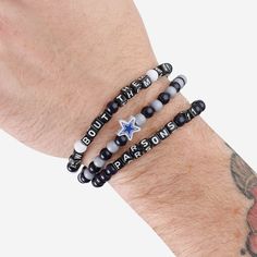 A whole new way to rep the team in style is here. Step up your fan fashion sense with this Dak Prescott & Micah Parsons Dallas Cowboys 3 Pack Player Beaded Friendship Bracelet. These matching friendship bracelets have an all-over team-colored design and team logo displays, which makes them the perfect way to show your support for the Dallas Cowboys on gamedays and every day in between. Every bead bracelet design is the perfect addition to your outfit, whether you’re heading to the game, watching Dallas Cowboys Clay Bracelets, Dallas Cowboys Beaded Bracelet, Cowboys Bracelet, Nfl Bracelets, Dallas Cowboys Jewelry, Dak Prescott Dallas Cowboys, Dak Prescott, Friendship Bracelets With Beads, Fan Fashion