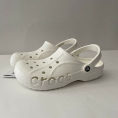 Crocs Baya Adult Unisex Clog Shoes Size: M8/W10 // M9/W11 // M11 Color: White Lightweight And Easy To Wear With Optional Heel Trap For More Secure Fit Water Friendly Material: Thermoplastic Eva Crocs Baya, Shoes Crocs, Clog Shoes, Crocs Shoes, Clogs Shoes, White Shoes, Flip Flop Sandals, Clogs, Flip Flops