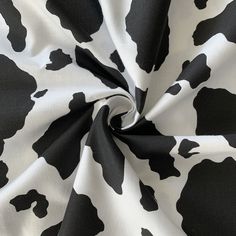 a black and white cow print fabric