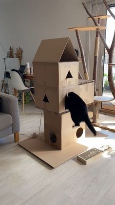 "An enchanting video pin featuring creative cardboard cat dens." Cardboard Cat House Template, Diy Cardboard Pet House, Cat Bed Out Of Cardboard, Diy Cat Fort Cardboard Boxes, Cardboard Cat Castle Diy, How To Make A Cat House, Cardboard Box Cat Tower, Cat Palace Diy, Cardboard Cat House Ideas