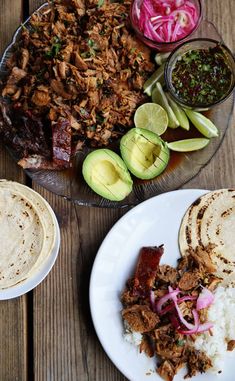 the meal on the table is prepared and ready to be eaten, including tortillas