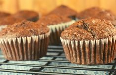 several muffins cooling on a wire rack