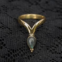 Pretty labradorite ring in gold colour made of brass. Available in a variety of sizes. We also have this design available with different gemstones: Moonstone, Amethyst or Turquoise. Please see our shop for details.For a size chart please go to www.ringsizes.co or send us a message if you have any questions about sizing. These are also available for wholesale.Do not hesitate to contact us if you have any questions or need more information. Like our facebook page for news and special offers:www.fa Unique Gold Labradorite Rings, Spiritual Gold Labradorite Rings, Unique Gold Moonstone Ring In Brass, Handmade Brass Moonstone Ring In Gold, Bohemian Gold Labradorite Jewelry, Bohemian Chic Style, Chevron Arrows, Bohemian Chic Fashion, Gold Chevron