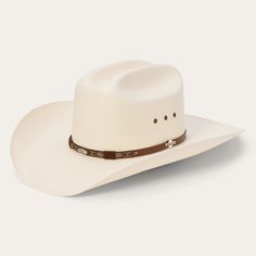 Handmade in the U.S.A. from high-quality shantung, the Rodeo 10X Straw Cowboy Hat has a 4 1/4” brim and a 4 1/2” cattleman crown with eyelets for increased circulation and breathability. Its rugged Western style is enhanced by a pick-stitch leather hat band and a genuine leather sweatband ensures a secure fit and all-day comfort. 4 1/2" Cattleman Crown With Eyelets 4 1/4” Brim L Oval Pick-Stitch Leather Hat Band Genuine Leather Sweatband 10X Quality Shantung Straw Handmade in the U.S.A. Stetson Straw Hats, Pick Stitch, Straw Cowboy Hat, Leather Hat, Casual Bottoms, Denim Boots, Leather Hats, Outdoor Men, Stitching Leather