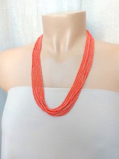 "Beaded necklaces, Salmon color beaded multi strand necklace. The necklace has 8 strands and it's available with silver and gold clasp. The size shown in the picture is 24\". Please read specifications on SIZES below: ❤ SIZES This item comes in several sizes, kindly choose at checkout. The easiest way to find out which length suits you best is to measure a necklace you already own, from one end to the next, including clasp. You can also use the diagram on the pictures as a reference, but keep in Multi-strand Beaded Necklaces, Coral Necklaces With Faceted Round Beads, Coral Necklace With Faceted Round Beads, Beaded Multi-strand Necklaces, Coral Multi-strand Beads For Jewelry Making, Coral Beaded Multi-strand Necklace, Elegant Coral Beaded Necklaces With Faceted Beads, Elegant Coral Beaded Necklace With Faceted Beads, Coral Beaded Necklaces With Faceted Beads