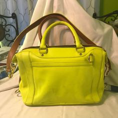 Rebecca Minkoff Mab Mini Brown Leather Satchel Handbag Large. Manufacturer Color: Almond/Neon Yellow Retail: $395.00 Condition: New With Some Discoloration See Pictures It Can Be Corrected By An Expert. Style Type: Satchel Handle Type: Detachable Bag Height (Inches): 10 Inches Bag Width (Inches): 13 Inches Bag Depth (Inches): 6 1/2 Inches Strap Drop (Inches): 15 Inches Material: 100% Genuine Leather Fabric Type: Leather Specialty: Colorblock Removable Shoulder Strap Included Modern Yellow Satchel With Gold-tone Hardware, Spring Yellow Satchel With Adjustable Strap, Designer Shoulder Bag With Leather Handles In Yellow, Designer Yellow Shoulder Bag With Leather Handles, Yellow Crossbody Satchel For Spring, Yellow Crossbody Satchel With Gold-tone Hardware, Yellow Shoulder Bag With Gold-tone Hardware For Travel, Designer Yellow Satchel With Detachable Strap, Yellow Satchel For Everyday Spring Use