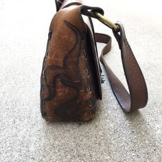 "Beautiful Vintage 60s or 70s Saddle Leather Handbag Purse Great Vintage Condition with Amazing Patina - unique hardware, and leather stitching, inside leather pocket Rough Measurements: Width: 10 1/2\" Length (the bag itself not including strap or ring handles): 9\" Depth (slightly Stretched): 4\" Will ship out between 1-3 business days once the payment has been made. Please message me w/ any questions. All sales final. And please check out my other vintage shirts!! thank you!" Vintage Leather Satchel With Leather Lining, Vintage Leather Satchel Bag, Brown Leather Shoulder Bag With Coin Pocket, Vintage Leather Rectangular Bag, Vintage Leather Saddle Bag For Travel, Vintage Leather Bag, Rectangular Shape, Vintage Style Rectangular Leather Bag, Retro Vintage Brown Leather Bags, Vintage Brown Leather Rectangular Saddle Bag