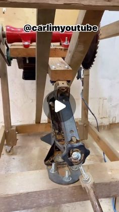 an image of a machine that is in the process of making something out of wood