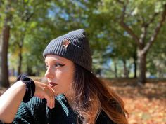 Give the gift of warmth and style! This knit beanie is perfect for hiking, camping, and perfect for keeping warm! Beanie is a dark charcoal gray color, and is made of a soft wool/acrylic blend. Attached is an engraved leather label tag with a brass rivet. The leather label is engraved on both sides, so whether you wear the hat with the brim up or down, the label will still show the design in the correct orientation. Choice of circle logo or trees available at checkout. Care - Hand wash, dry flat Warm Outdoor Hat One Size, Adjustable Knitted Beanie For Outdoor, Outdoor Adjustable Knitted Beanie, Fall Beanie For Everyday Use, Outdoor Soft Knit Beanie Cap, Outdoor Soft Knit Beanie, Warm Everyday Hats For Fall, Casual Soft Knit Hats For Outdoor, Fall Everyday Beanie