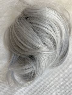 Fall hair colors of gray hair 2023 Light Gray Hair, Grey Hair Color Silver, Grey Hair Pieces, Messy Bun Hair Piece, Bun Ponytail, Bun Hair Piece, Bun Styles, Silver Grey Hair, Hairstyle Inspiration