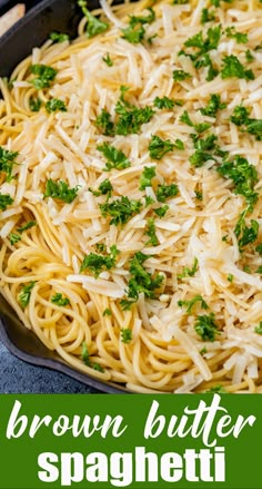 a skillet filled with brown butter spaghetti and parmesan cheese sprinkled on top