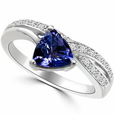 This unique promise ring is made with a deep-blue trillion-cut tanzanite and dazzling diamonds. The ring is available in all precious metals. Argentium Silver Jewelry, Unique Promise Rings, Diamond Promise Ring, Tanzanite Jewelry, Diamond Rings Design, Diamond Cocktail Ring, Diamond Promise Rings, Tanzanite Diamond, Best Engagement Rings