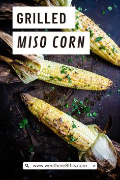 grilled miso corn on the cob with parsley sprinkled on top