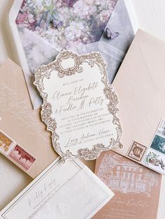 wedding stationery with envelopes and postcards on top of each other in an envelope