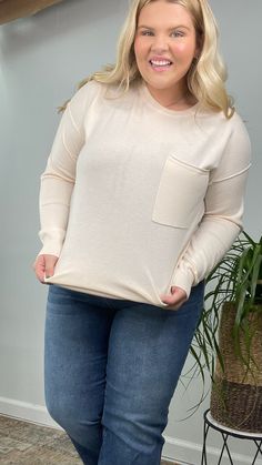 Coffee & Cream Curvy Split Side Sweater Savor the style and comfort of this curvy split side sweater, perfect for pairing with your morning coffee or an evening out. Its neutral tones and relaxed fit offer a versatile look that's as soothing as your favorite latte. The split sides add a modern touch, making it easy to layer over a cami or a collared shirt for added warmth and chic styling. Size: 1XL, 2XL, or 3XL Color: Cream Relaxed Fit Beige Sweatshirt With Ribbed Cuffs, White Half-zip Sweatshirt With Ribbed Cuffs, Beige V-neck Sweater With Ribbed Cuffs, Versatile Half-zip Sweatshirt With Ribbed Cuffs, Cream V-neck Sweater With Ribbed Cuffs, Fall Photo Outfits, Cropped Wide Leg Jeans, Coffee Cream, Book Clothes