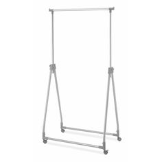 a large metal rack with wheels on the top and bottom, holding two clothes racks