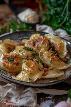 a plate of pasta with shrimp and parsley on the side, ready to be eaten