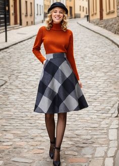 Embrace a bold, modern look with this A-line midi skirt featuring a striking black and grey geometric pattern. Its high-waisted design and flared silhouette offer an elegant, feminine shape, perfect for any occasion. ★★ FEATURES * 30% wool, 30% fiber, 40% polyester * Polyester lining * Two side seam pockets * Right zipper closure * back little elastic band * Plus size full skirt * A Line Skirt * Perfect for Winter, autumn * Dry clean ★★ The model is 170 cm (5′ 7″) tall with a 80 cm (31.5") bust, 66 cm (26") waist. She is wearing the wool plaid skirt in size XS. ★★ Bespoke Order Service If you Request other color Request the length Your height is not between 155 cm- 172 cm Your weight is over 75 kg I can do it for you, It will need some extra fee depending on on your need. Contact with me f A Line Skirt Winter Outfit, Plaid Pencil Skirt Outfit, Full Skirt Outfit, Winter Skirts, Plaid Wool Skirt, Skirt A Line, Tartan Skirt, Skirt Knee Length, Rock Outfit