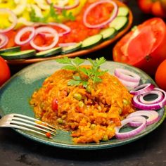 two plates filled with food sitting next to each other