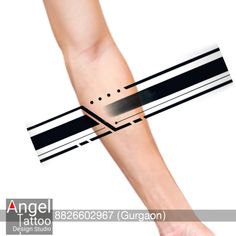 a person holding their arm with an arrow in the middle and lines on it that are black and white