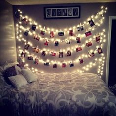 a bed with lights and pictures on it