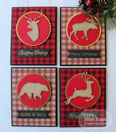 four christmas cards with deer, moose and buffalo silhouettes on red and black checkered paper