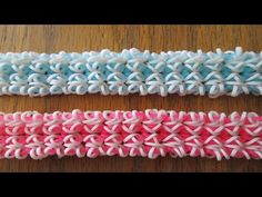 two crocheted bracelets sitting on top of a wooden table