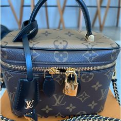 Perfect Vanity Bag! Authenticated! Comes In Original Dust Bag And Box. Comes With Gold Lv Lock And Keys! In Perfect Condition! Hardly Worn! Bags Louis Vuitton, Vanity Bag, Lock And Key, Louis Vuitton Bags, Louis Vuitton Bag, Louis Vuitton Monogram, Dust Bag, Vanity, Bag Lady