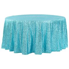 a round table covered in blue sequins