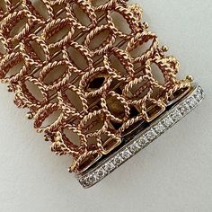 Roberto Coin 18K Rose Gold Mesh Bracelet with 27 Full Cut Diamonds (est. retail: $14,000) Designer = Roberto Coin Material = 18K Gold Gemstone = Diamond Condition = Excellent Class = Premier Location: Wilmette Item Number: 11405-1237 Item ID: 283162 Category: Bracelet Luxury Jubilee Diamond Bracelet For Evening, Elegant Pink Gold Jubilee Bracelet, Luxury White Gold Bracelet With Pave Setting, Luxury Gold Bracelet With Pave Setting For Formal Occasions, Luxury Hand Set Diamond Bracelet For Evening, Luxury Rose Gold Bracelets, Luxury Yellow Gold Bracelet With Pave Setting, Luxury Pink Gold Diamond Bracelet, Luxury Rose Gold Bracelet For Wedding