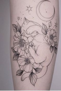 a woman's thigh with flowers and a sleeping fox on the moon tattoo design