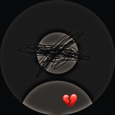 a black and white photo with a red heart in the center on a dark background