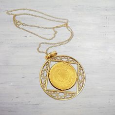 Product Details: Coin Material: 22K Solid Yellow Gold Coin Diameter: 22 mm Coin Thickness: 1.52 mm Coin Purity: 91.67% Chain Material: 14K Solid Yellow Gold Chain Length: 16 Inches Weight: 0.82 Grams Necklace Style: Rope Chain Closure Style: Spring Ring Only ships within United States Coin, Bezel and Chain Features: Total Weight: 14.62 Grams (Gold) Handmade item Bezel Material: 22K Solid Yellow Gold Bezel Size: 1.5 Inch Victorian 22k Gold Hallmarked Jewelry, Traditional Coin Pendant Jewelry For Formal Occasions, Traditional Coin Pendant Jewelry For Formal Events, Gold Coin Jewelry For Anniversary, Handmade Coin Shaped Yellow Gold Jewelry, Handmade Coin-shaped Yellow Gold Jewelry, Round Brass Jewelry With Bezel Setting, Formal Yellow Gold Coin Jewelry, Traditional Gold Coin Jewelry