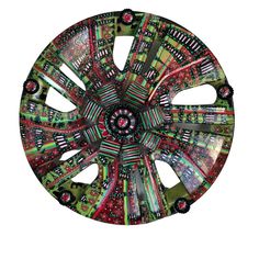 a circular object with many designs on it