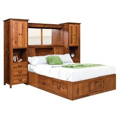 the bed is made and has drawers on both sides, along with an armoire for storage