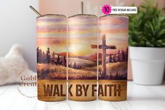 three candles with the words walk by faith painted on them