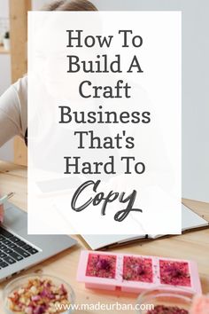 a woman working on her laptop with the words how to build a craft business that's hard to copy