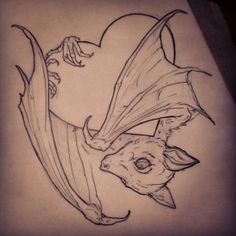 a pencil drawing of a bat with horns on it