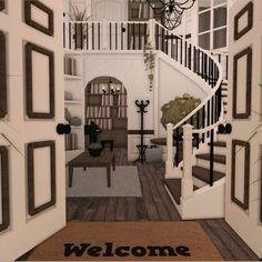 a welcome mat is shown in front of the stairs and entry way to a house