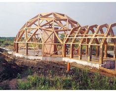 a house being built on the side of a hill