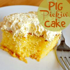 a close up of a piece of cake on a plate with a fork next to it